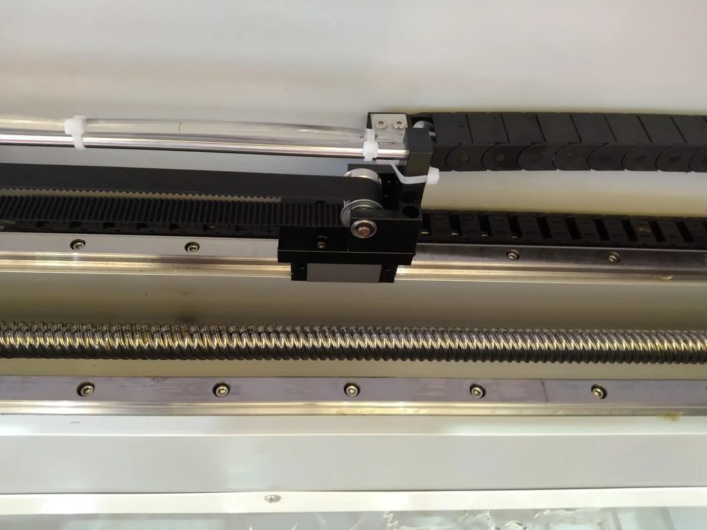 Ball screw and linear guide assembly inside the open 6060FL fiber laser cutter