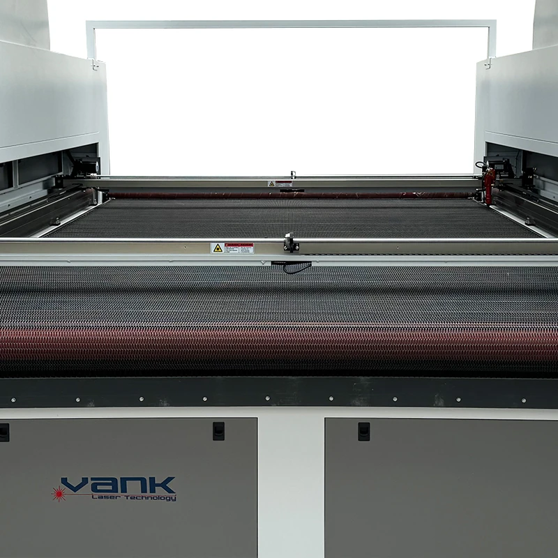 Open worktable and feed roller on a CO2 fabric laser cutting machine