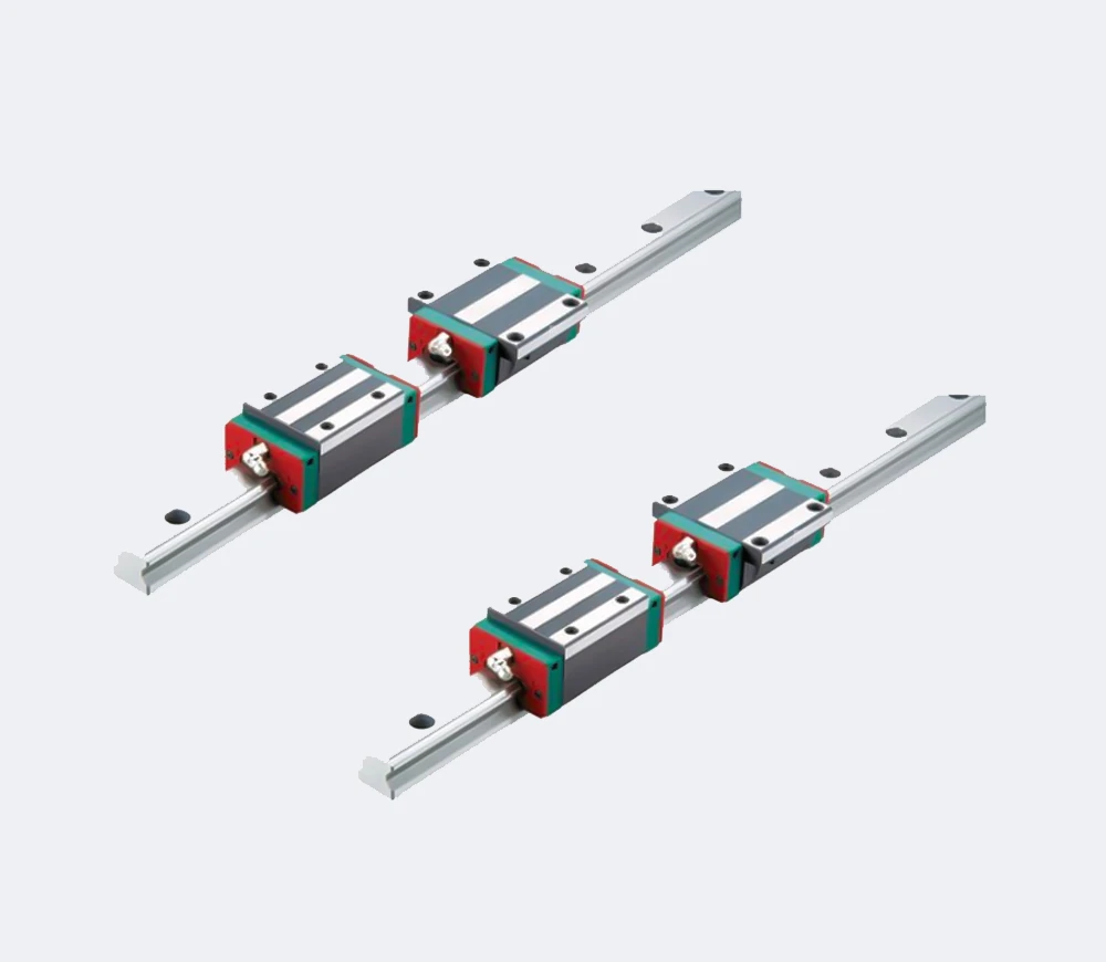 Two linear guide rails with bearing carriages for a laser cutting machine