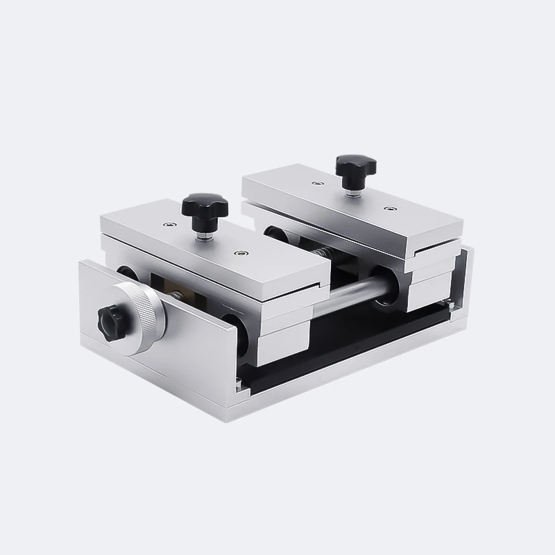 Adjustable clamping fixture with two holding blocks for small jewelry parts