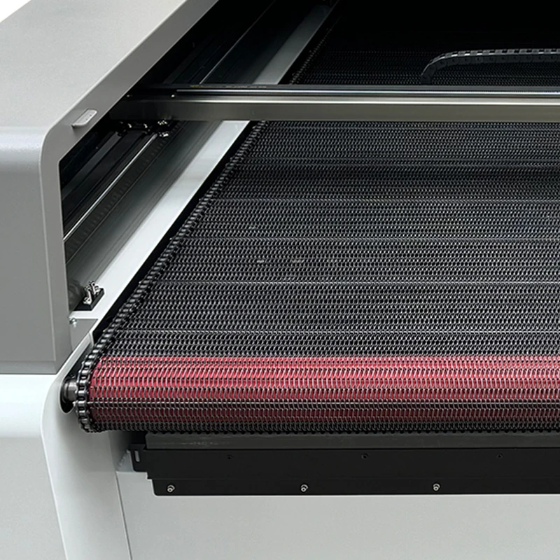 Mesh conveyor worktable and guide rail on a textile laser cutter