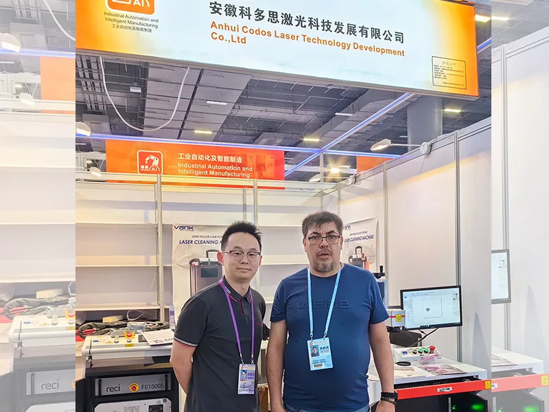 Vank Laser booth with laser equipment and visitors at the Canton Fair 2024 in Guangzhou.