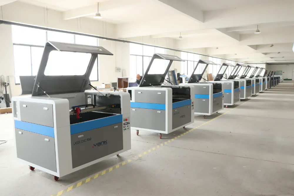 Laser cutting machines with raised lids in the workshop